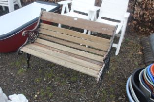 An ornate two seater garden bench