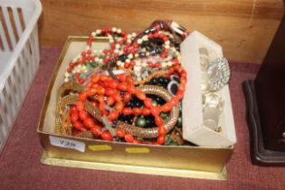 A box of various costume jewellery