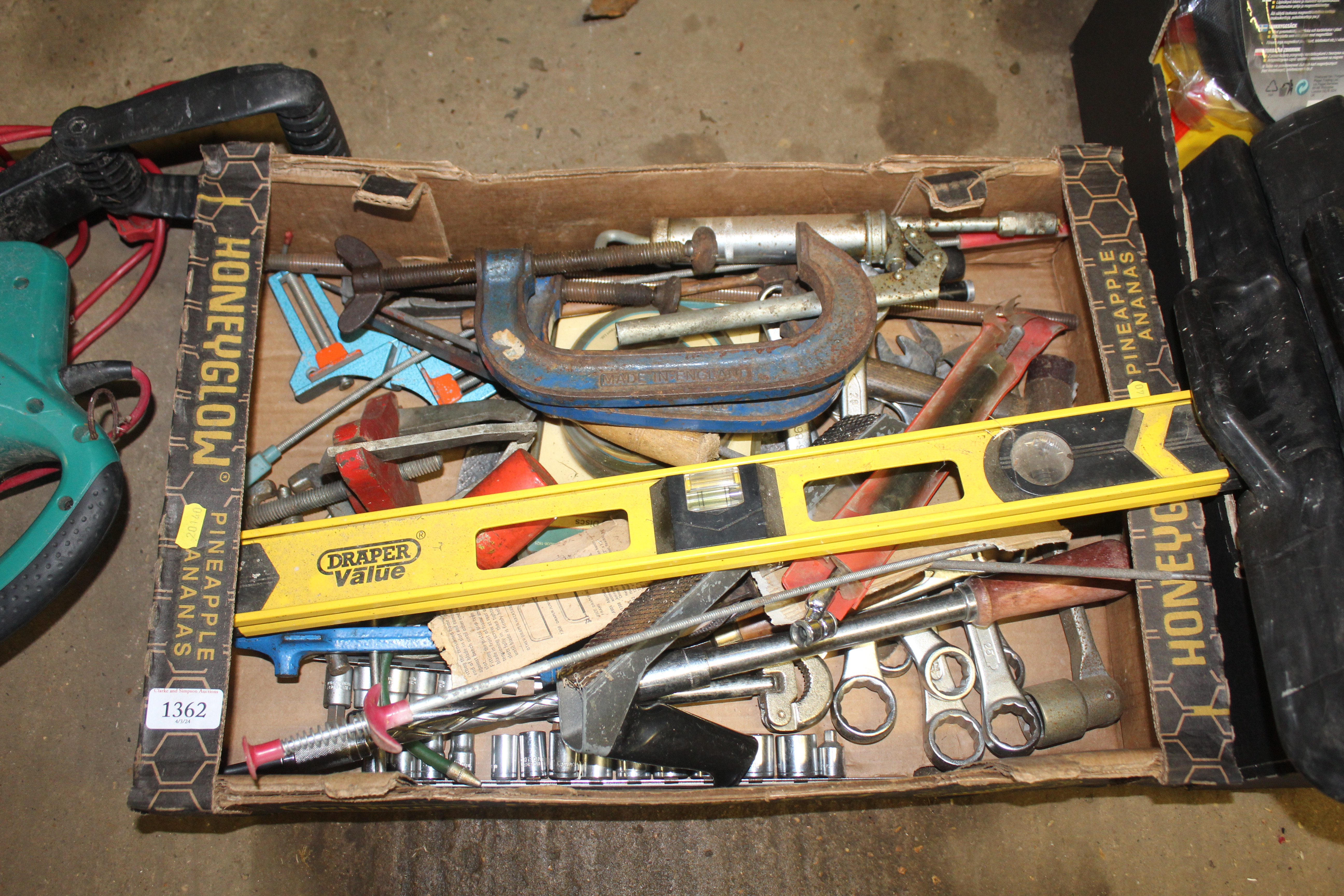 A tray box containing various tools to include a D