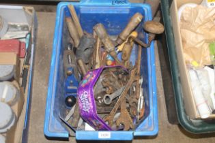 A plastic crate and contents of tools to include v