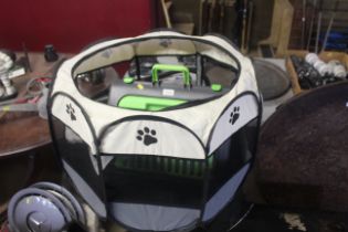 A folding plastic pet carrier and a expanding pet