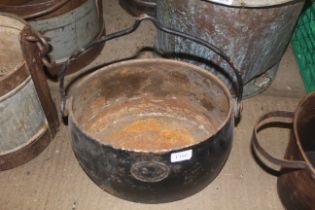 A Kenrick & Sons cast iron 3 gallon cooking pot wi