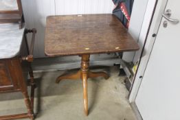 A 19th Century oak and elm snap top tripod table