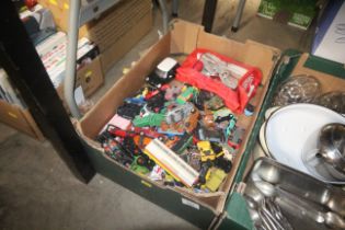 A box of various die cast toys etc.