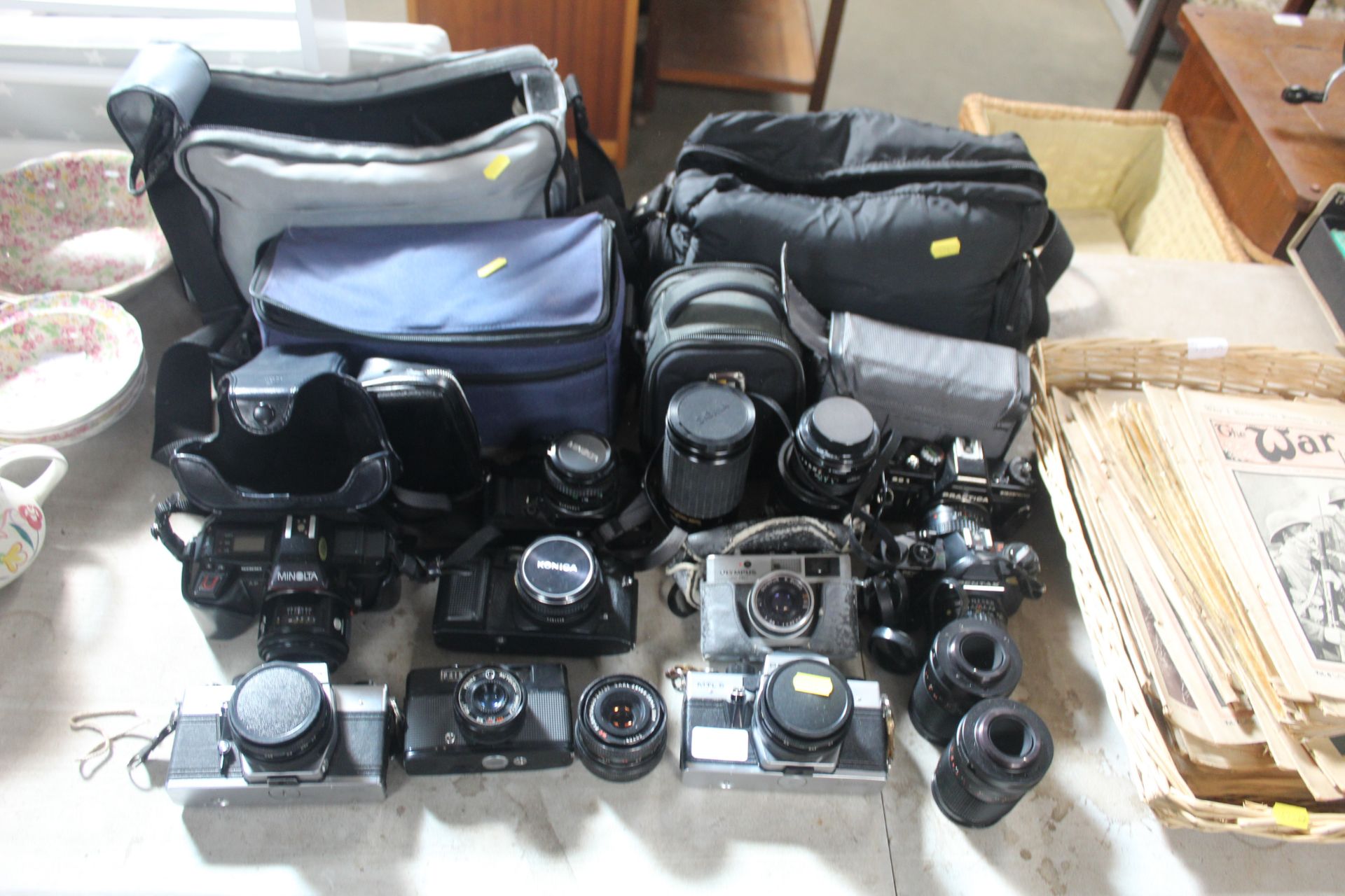 A collection of various cameras to include Praktic