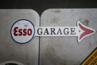 A cast iron Esso garage sign