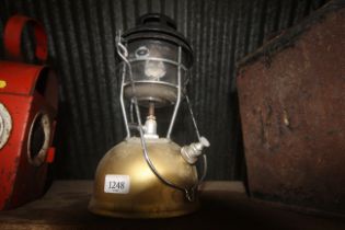 A hanging Tilley oil lamp