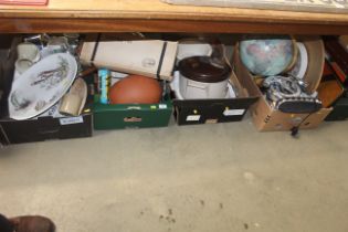 Four boxes containing Chanel style table lamp, wall clock, world globe, various kitchenalia, glass