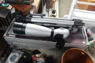 A Spektiv spotting scope with tripod and original