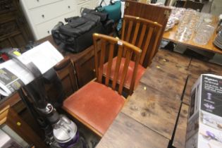 Two teak G-Plan design flatback dining chairs