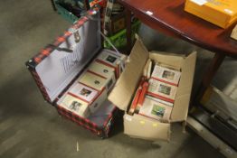 A collection of various books and a tartan pattern s