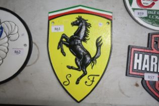 A cast iron Ferrari sign