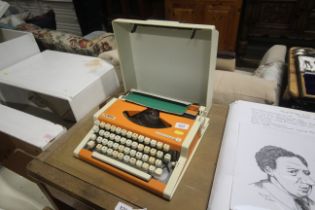 An Olympia Traveller Deluxe S portable typewriter
