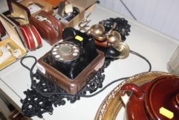 A vintage style wall mounting telephone
