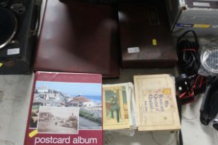 A collection of miscellaneous cigarette card album
