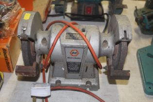 A Black & Decker 5" dual wheel bench grinder