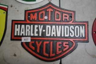 A cast iron Harley Davidson sign