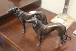 Two bronzed dog ornaments