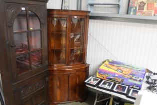 A reproduction Yew finish floor standing corner c