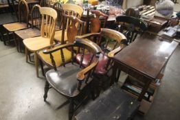 A pair of upholstered smokers bow elbow chairs and