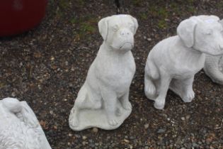 A cast concrete garden statue in the form of a sea