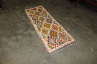 An approx. 6'7" x 2'4" Chobi Kilim runner