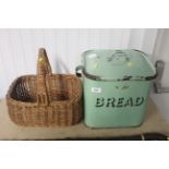 A vintage enamel bread bin and a wicker basket