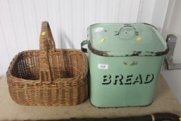 A vintage enamel bread bin and a wicker basket