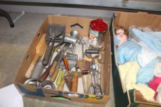 A box of miscellaneous vintage kitchen utensils