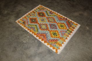 An approx. 4' x 2'10" Chobi Kelim rug