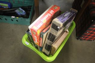 A box of miscellaneous games etc