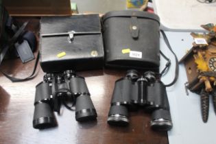 A pair of Copal 10x50 binoculars and a pair of Pri