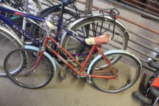 A child's Rodeo bicycle with front and rear mud gu