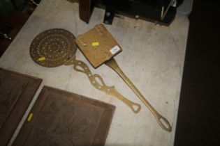 A pierced brass skimmer (previously repaired) toge