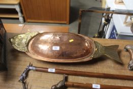 An Arts and Crafts type copper and brass serving d