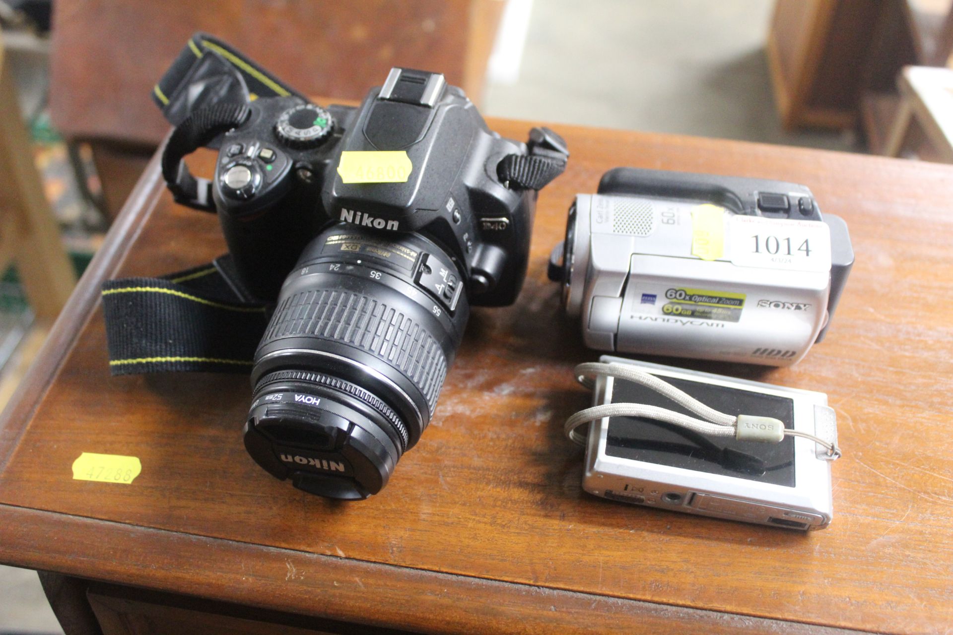 A Nikon D40 camera, a Sony Handycam and a Sony