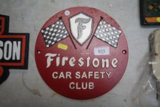 A cast iron Firestone safety sign