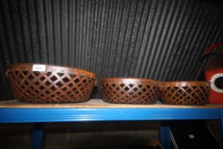 Three graduated lattice work bowls with twin ring