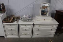 A white dressing table with swing mirror and a pai