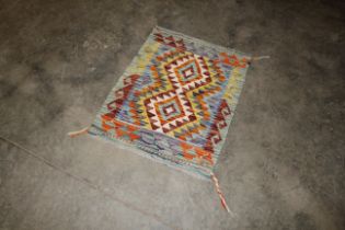 An approx. 2'9" x 2'1" Chobi Kilim rug