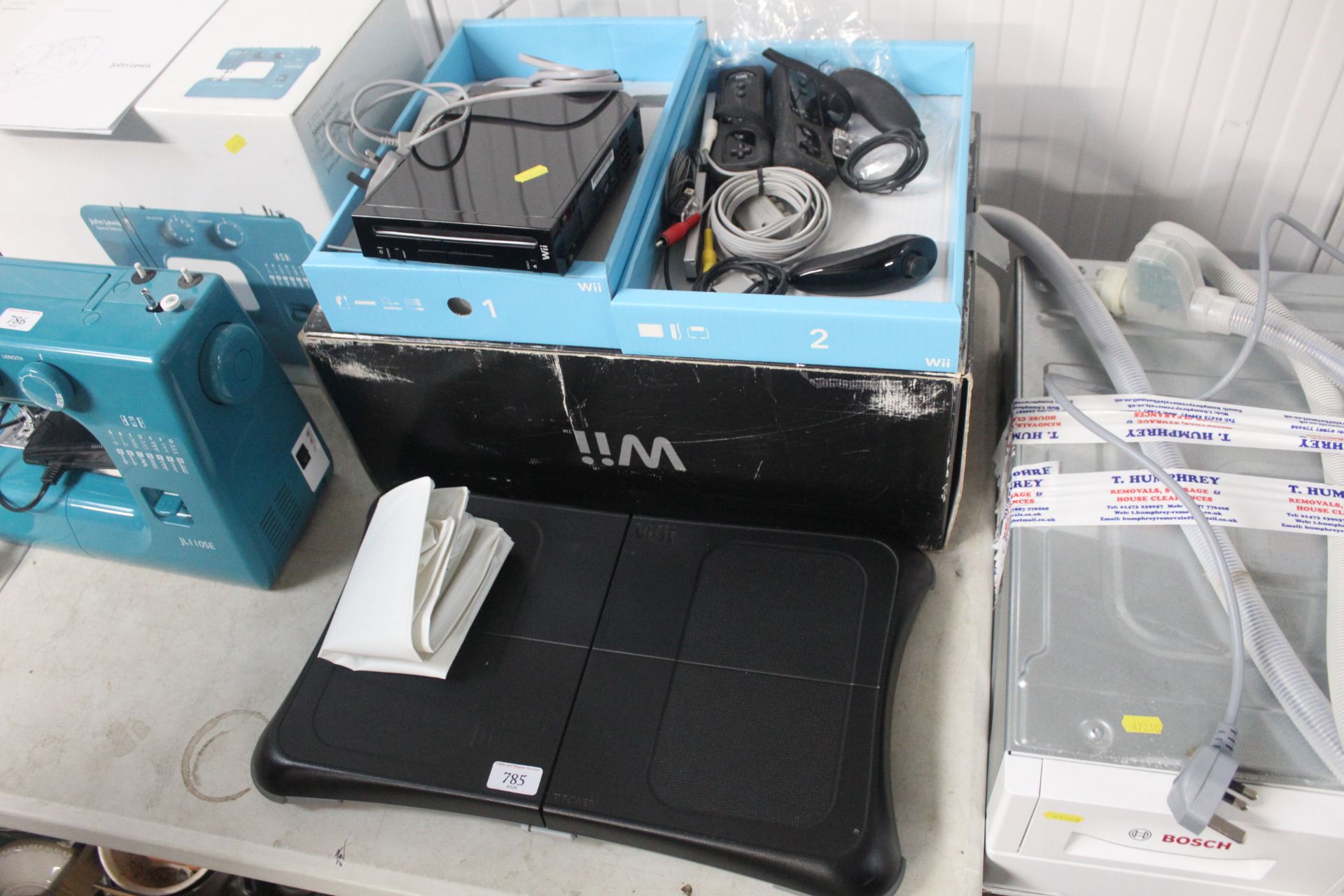 A Nintendo Wii, Wii board and accessories