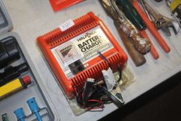A Halfords battery charger as new
