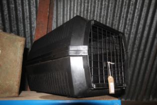 A plastic Pet Voyager 300 pet carrier