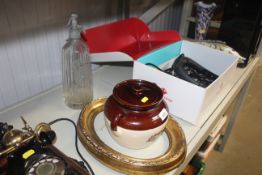 A vintage soda syphon, a pottery and floral decora
