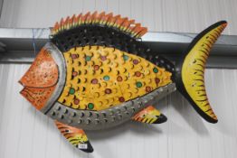 A metal ware fish ornament