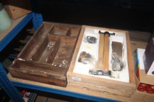 A wooden cased set of hammers and accessories toge