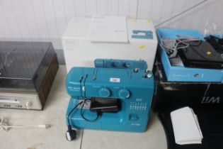 A John Lewis Special Edition sewing machine with b