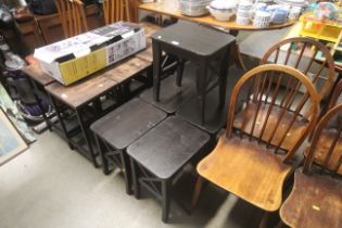 A quantity of modern black wood stools and occasional tables - this lot is subject to VAT on the