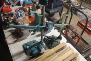 Two Black and Decker drill presses and a further B