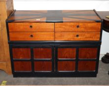 A Nathan teak and ebonised side cabinet fitted four drawers and cupboards below, 102cm wide x 45.5cm